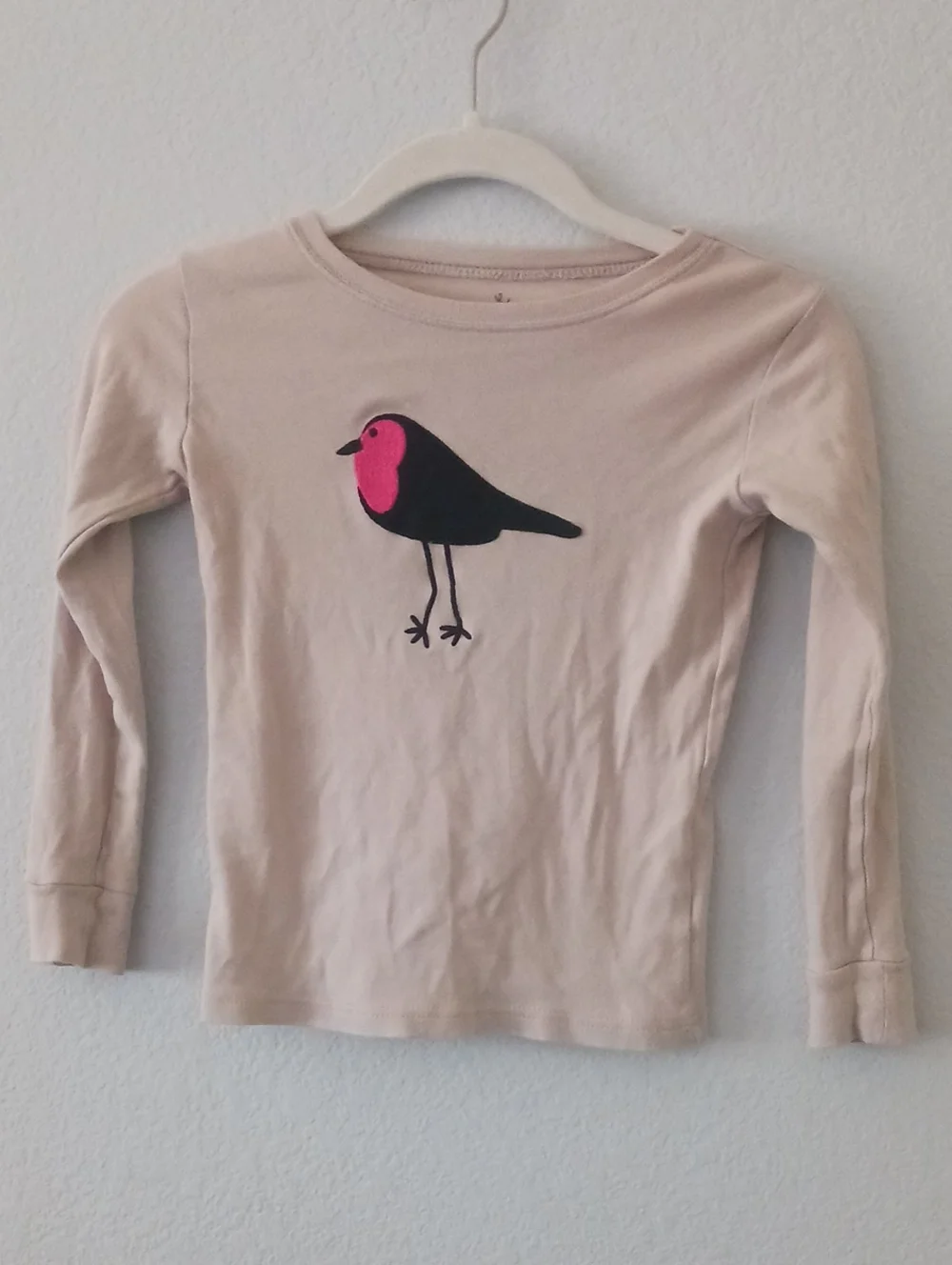 10/$13❗️SALE❗️🔴Kids Long-Sleeve Beige Top with Pink-Black Bird Graphic